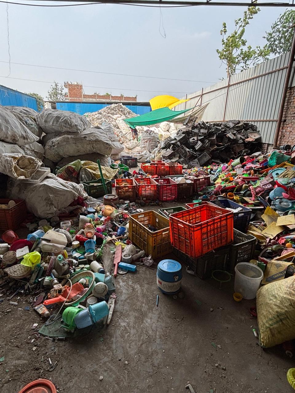 Material recovery yard with sorted plastics and bulk sacks